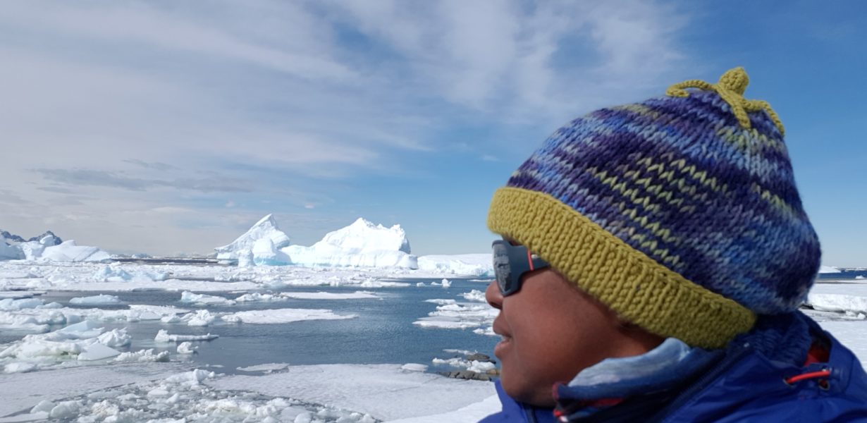 Black female onboard boat in the Antarctic region