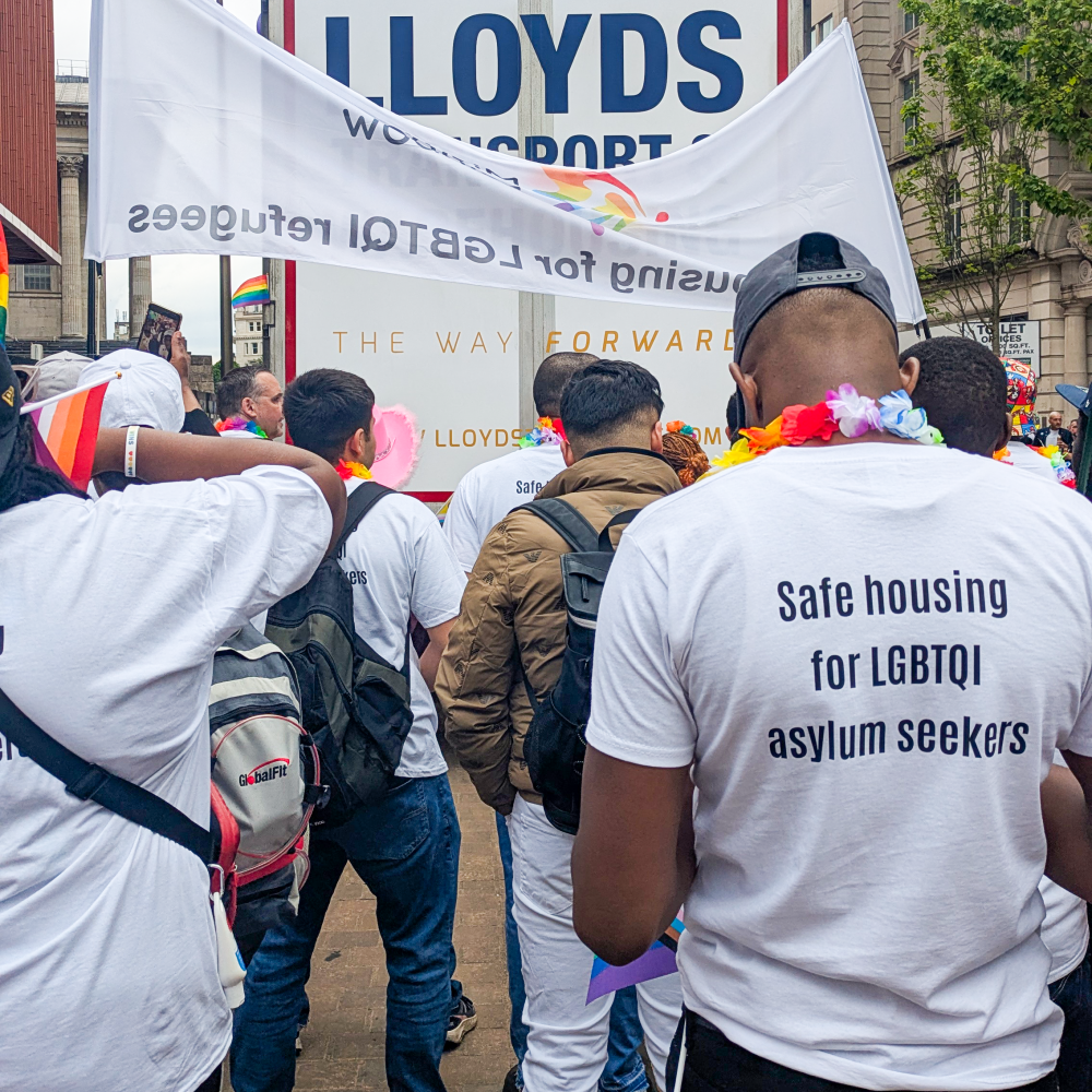 Safe housing for LGBTQIA+ refugees marching at Birmingham Pride 2025