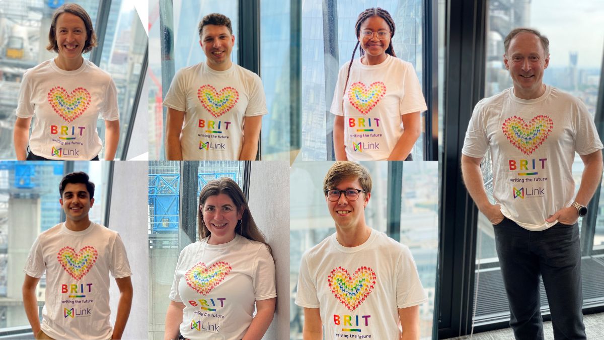 Brit employees wearing Link - LGBTQ+ Insurance Network T-Shirts.