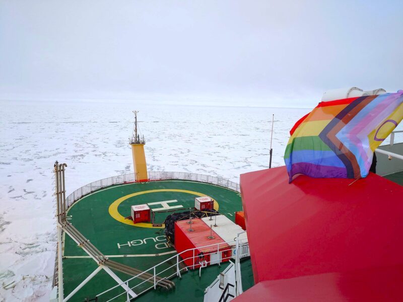 The progress Pride flag flies on the RRS Sir David Attenborough as it transits from the Falkland Islands to Rothera Research Station (Photo Chris Walton)