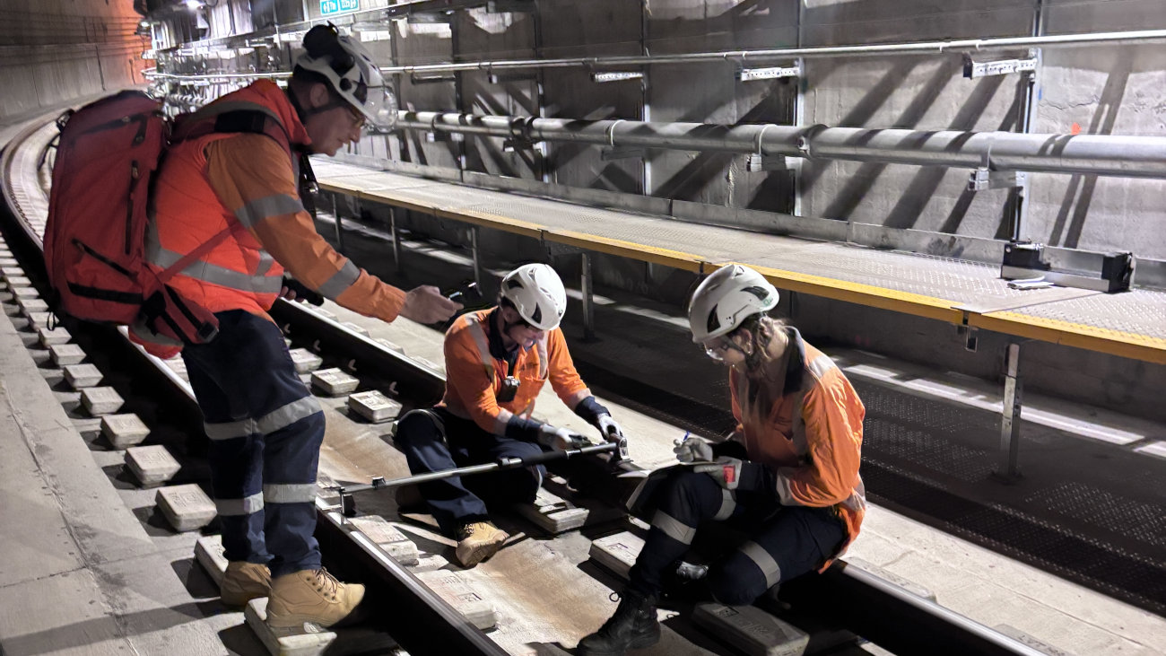 Zoe and collegues working on a rail track