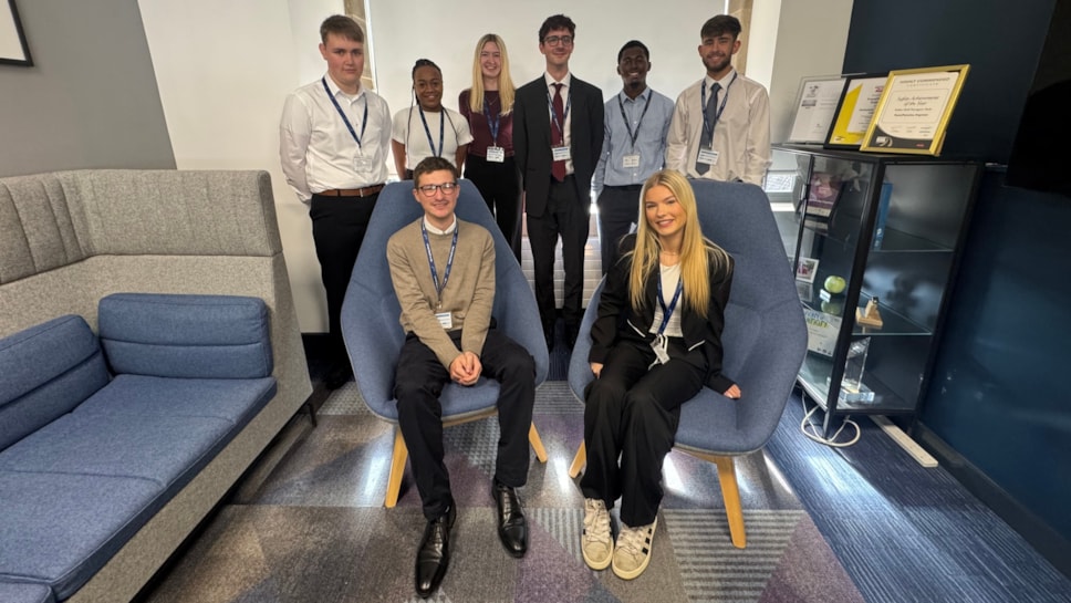 A group of young apprentices of different race and gender
