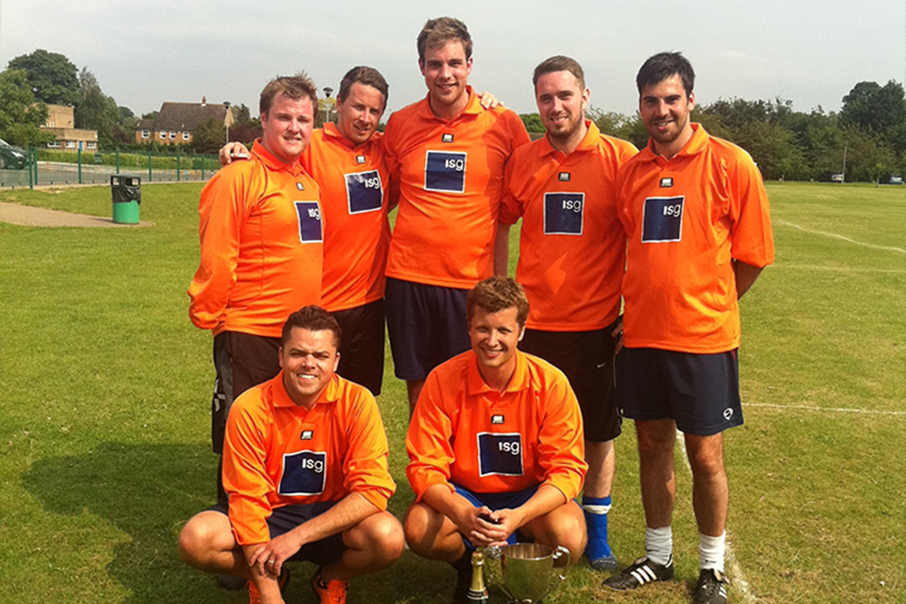 Sam with team