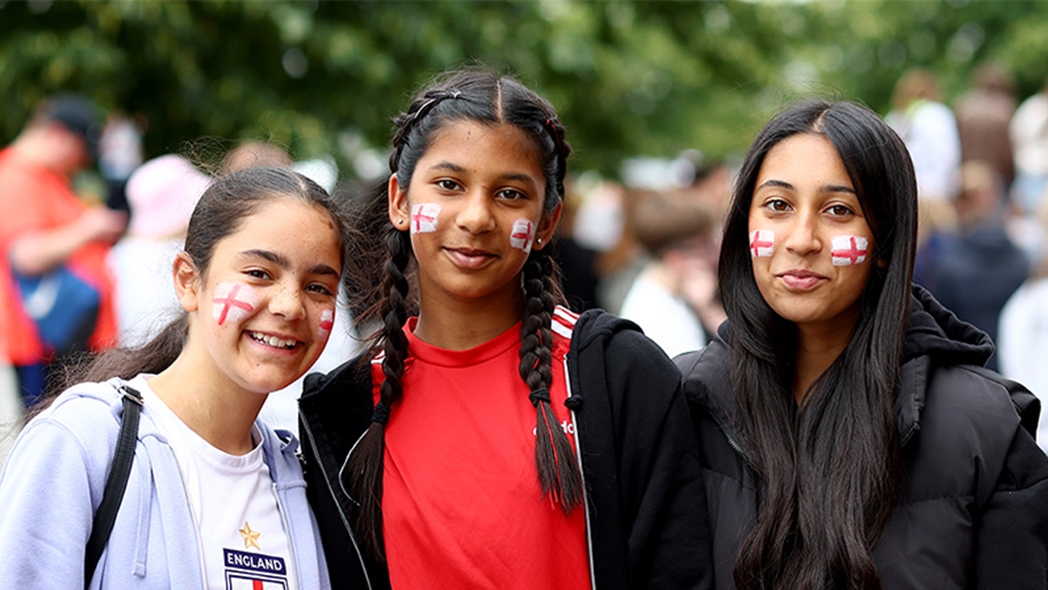 Girls with England flag face paint