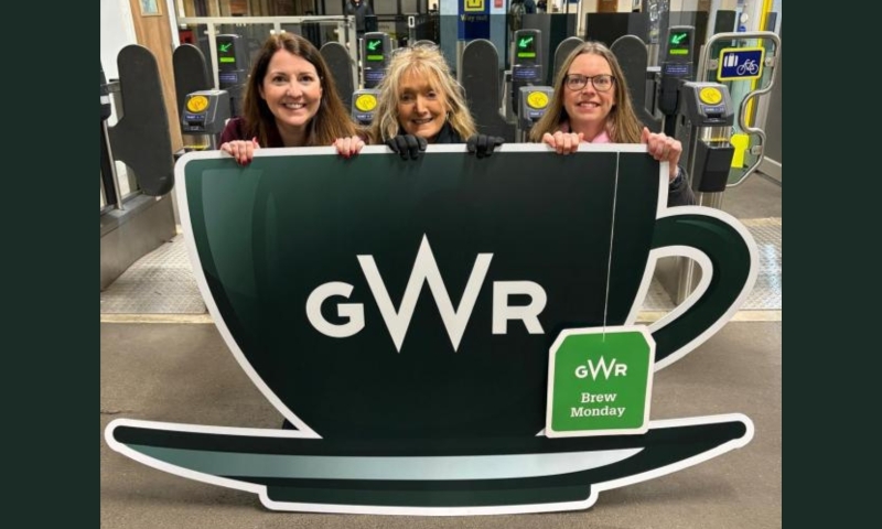 GWR three staff members in a cardboard cutout teacup