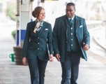 Two GWR collegues talking to each other on a train platform