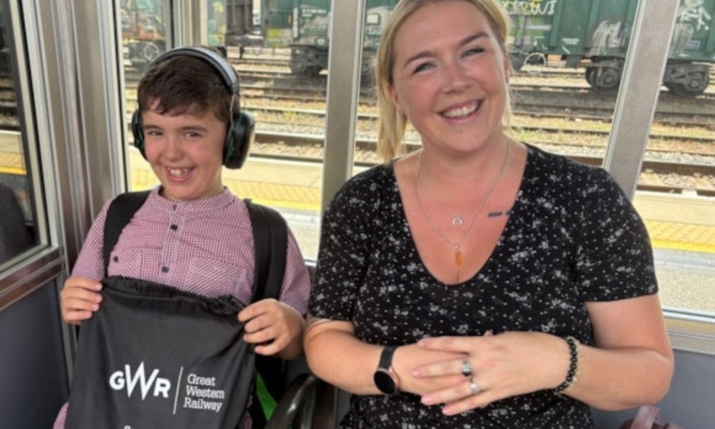 A mother and autistic son on the train
