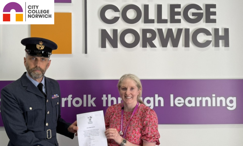 Hospitality and Catering lecturer, and RAF Reservist, Bob Oberhoffer, and Chief Operating Officer, Jen Eves, signing the Armed Forces Covenant on behalf of the college.