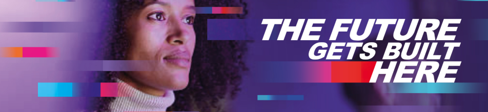 This horizontal banner features a modern, tech-inspired design set against a rich purple background. The visual composition combines photography with bold typography and vibrant graphic accents.  Key Visual Elements Subject: On the left side, there is a close-up portrait of a woman with dark curly hair and a dark skin tone, facing right in profile/three-quarter view. She is wearing a light-coloured turtleneck jumper (sweatshirt/knitwear) illuminated by soft ambient lighting with purple, pink, and blue hues.  Typography: On the right side, large, bold, italicised white text in capital letters reads:  THE FUTURE  GETS BUILT  HERE  Graphic Overlay & Style Colour Palette: Predominantly vibrant shade of purple background, accented with bright neon tones including magenta pink, cyan blue, and orange.  Glitch/Digital Effects: Horizontal rectangular blocks with dynamic gradient transitions (blue to magenta, orange to pink) overlay the subject and text, giving the banner a motion-blurred, high-tech, or digital aesthetic.
