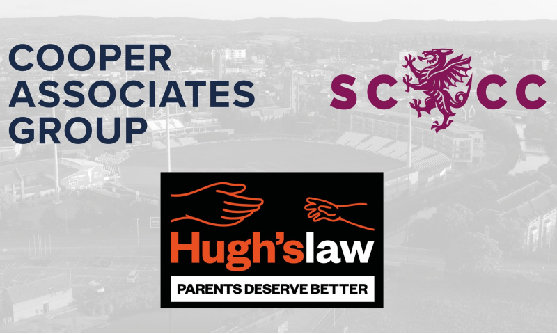 The image features a composite design overlaying several logos onto a faded, greyscale aerial photograph of a sports venue—specifically a cricket ground with floodlights and grandstands visible.  Top Left: Dark blue, bold sans-serif text reading "COOPER ASSOCIATES GROUP".  Top Right: Maroon letters "SC" and "CC" flanking a detailed illustration of a maroon wyvern (the crest of Somerset County Cricket Club).  Bottom Centre: A prominent black rectangular box containing:  An orange line-art graphic of two extended arms and hands reaching towards each other.  The branding "Hugh'slaw" with "Hugh's" in bold orange and "law" in bold white.  A white rectangular bar at the bottom with the capitalized black text "PARENTS DESERVE BETTER".