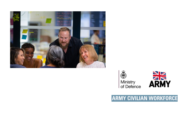 This graphic features a workplace photograph alongside official UK Ministry of Defence branding on a clean white background.Image BreakdownLeft (Photograph):A group of five colleagues gathered in a modern office or meeting space.   In the centre, a man with a light brown beard wearing a black shirt leans forward over a table or glass divider to speak with the group.   Surrounding him are four women who are smiling and engaged in conversation.   In the background, a transparent glass partition or whiteboard is visible, covered with colourful sticky notes and written notes.   Right (Branding and Logos):Ministry of Defence Logo: Features the official emblem (a crown resting above an anchor, crossed swords, and eagle wings) alongside the text "Ministry of Defence" in black, sans-serif font.   British Army Logo: Features the stylized Union Flag emblem with the word ARMY underneath in bold, black lettering.   Banner: A light greyish-blue horizontal bar at the bottom containing the white uppercase text "ARMY CIVILIAN WORKFORCE".