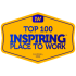 This image displays an award emblem for "Top 100 Inspiring Workplaces".   Visual DetailsShape & Colour: A shield-like hexagonal emblem with a bright yellow/gold fill surrounded by a double dark blue border.   Top Header: Features a small dark blue rounded tag at the top peak with yellow text reading "IW" (Inspiring Workplaces).   Main Text:The center features dark blue typography reading "TOP 100 INSPIRING™ PLACE TO WORK" in bold, sans-serif lettering.   Bottom Footer: Small dark blue text at the bottom apex reads "GLOBAL 2026".